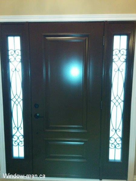 Single steel entry insulated front door with two sidelights. Raised Executive panels. Brown outside, white inside. Painted in spray booth. View from inside door 1047